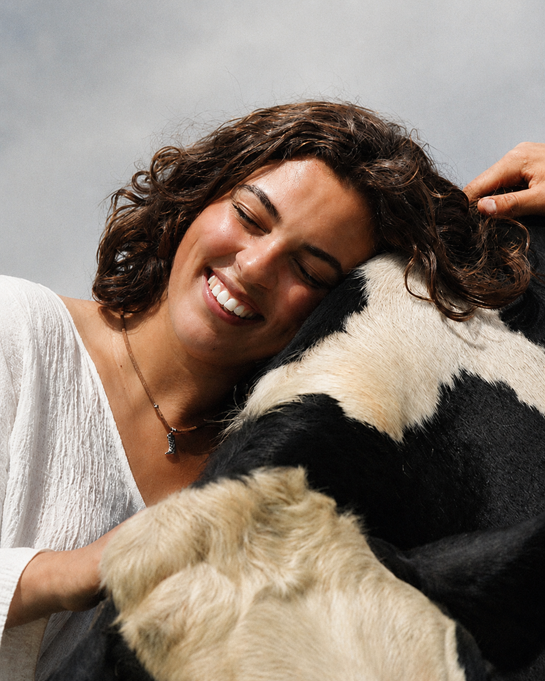 Mariana with a cow